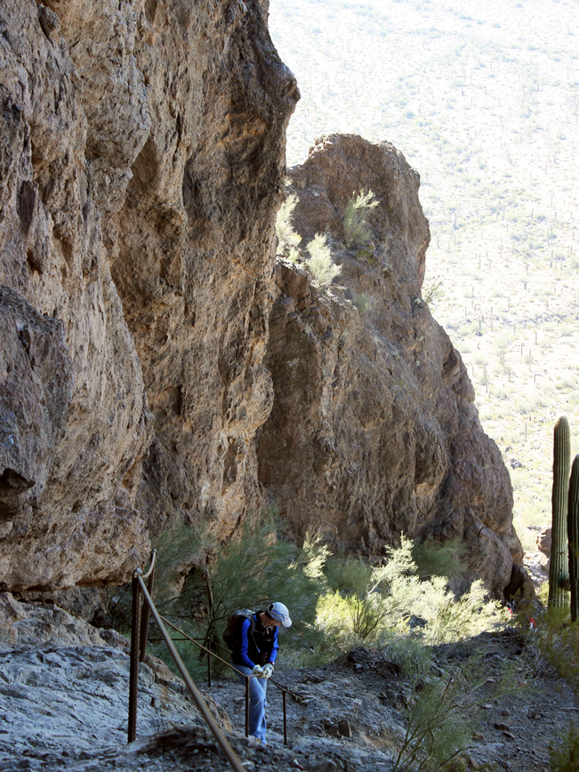 Hiker, Descending, Cables,Rock Scramble, Hunter Hiking Trail to Picacho Peak, Tucson, Arizona