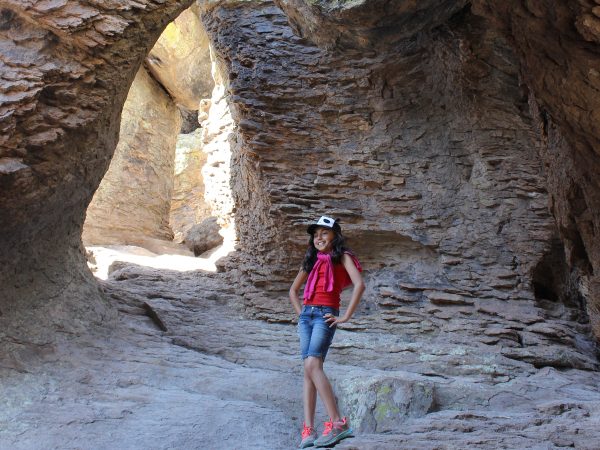 Girl, Hiker, Grotto, Southeastern, Arizona, Chiricahua National Monument, Echo Canyon Hiking Trail, Willcox, Moderate Hikes, Family Friendly Hikes, Southern Arizona HIkes A close up view of a wild flower along the shores of West Clear Creek off of the Maxwell Hiking Trail, outside of Flagstaff and Strawberry, Arizona, with the creek and reeds behind them. Moderate Arizona hiking trails. Flagstaff area hiking trails. Arizona hiking trails with water. Copyright AZUtopia. No use without permission.