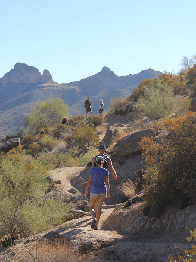 A landscape view of Hikers on the Pass Mountain Hiking Trail Loop, in Usery Park, outside of Mesa Arizona. Phoenix area hikes. Moderate hikes. Copyright azutopia. No use without permission. 