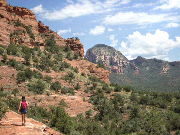 Hiker; Mescal Hiking Trail; Sedona; Arizona; Red Rocks; Cliffs; Mesa; Bluffs; Easy Hiking Trails; Family Friendly Hiking Trails; Pet Friendly Hiking Trails. Copyright azutopia.com. No use without permission.
