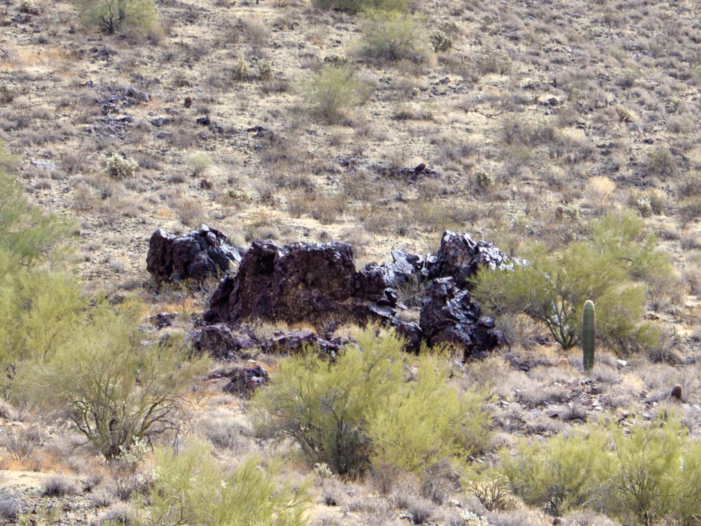 Large outcropping of Black Quartz; Side of hill; desert; Dixie Mountain Hiking Trail; Sonoran Desert Preserve; Phoenix; Arizona; Moderate Hiking Trails; Family Friendly Hiking Trails; Copyright azutopia. No use without permission.